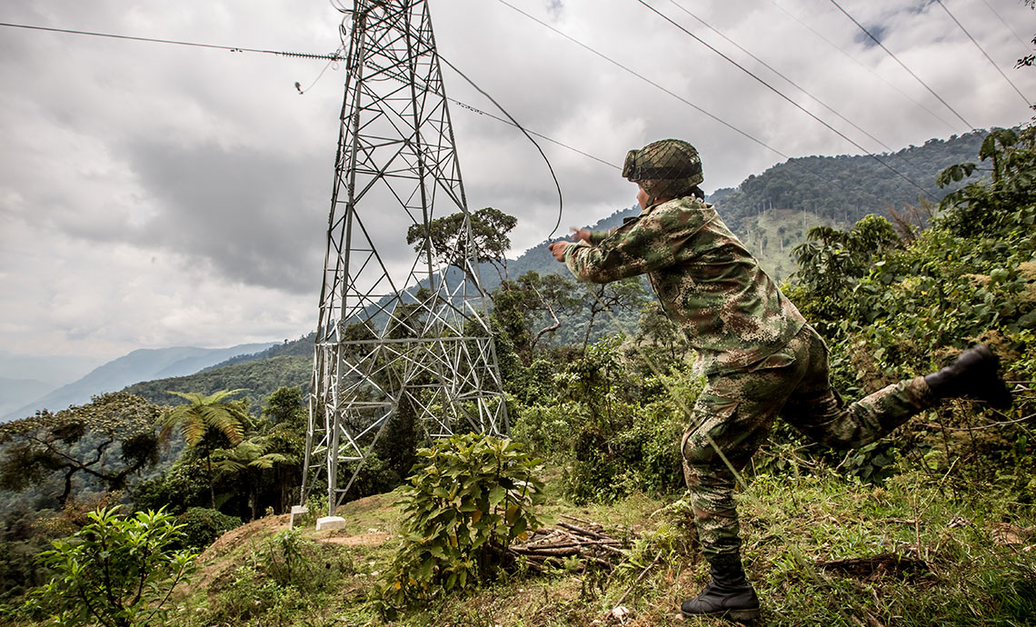 A soldier performing humanitarian demining.